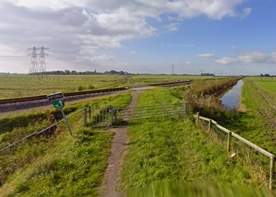De spoorwegovergang voor fietsers zoals het was.